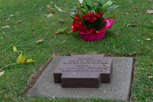 A grave tended by family